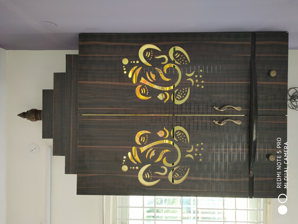 Pooja room and warm wood finishes